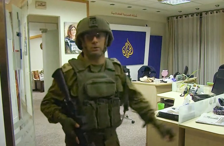 Israeli soldiers raid, order closure of Al Jazeera office in Ramallah [Screengrab/Al Jazeera]